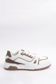 Tenis casuales unicolores con suelas planas y contrastes