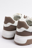 Tenis casuales unicolores con suelas planas y contrastes