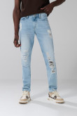 Jean tiro bajo slim azul claro con rotos y bolsillos