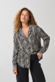 Blusa estampada unicolor con botones y manga larga