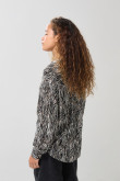 Blusa estampada unicolor con botones y manga larga