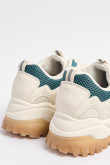 Tenis chunky en color crema claro con contraste color verde