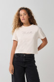 Camiseta unicolor crop top con arte college delantero