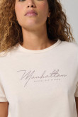 Camiseta unicolor crop top con arte college delantero