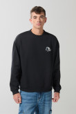 Buzo oversize negro cuello redondo con diseño de dados