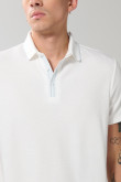 Camiseta polo crema clara con manga corta y botones