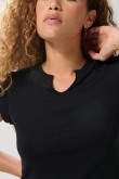 Camiseta manga ranglan unicolor con abertura en frente