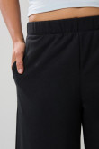 Pantalón unicolor jogger con bota recta en tela gruesa