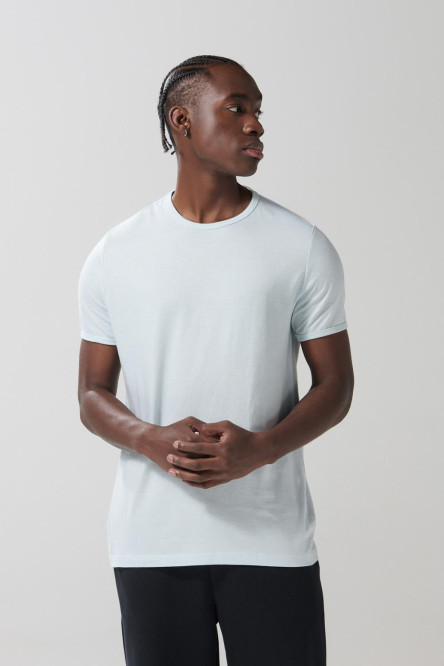 Camiseta unicolor con puños y cuello redondo en rib
