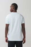 Camiseta unicolor con puños y cuello redondo en rib