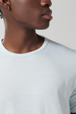 Camiseta unicolor con puños y cuello redondo en rib