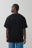 Camiseta negra oversize manga corta con arte de Star Wars