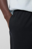 Pantalón unicolor tipo jogger bota recta con bolsillos