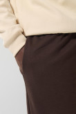 Pantalón unicolor tipo jogger bota recta con bolsillos