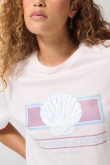 Camiseta unicolor cuello redondo con diseño de playa