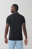 Camiseta unicolor polo con manga corta y aberturas