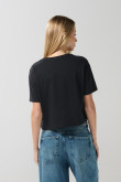 Camiseta crop top negra con diseño de Félix el Gato