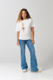 Camiseta crema cuello redondo con arte de Looney Tunes