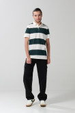 Camiseta polo unicolor con rayas y cuello en contraste