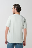 Camiseta unicolor cuello redondo con estampado de playa