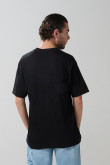 Camiseta negra con arte de Looney Tunes y manga corta