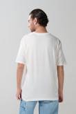 Camiseta cuello redondo crema con diseño de Looney Tunes