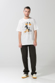 Camiseta crema manga corta con arte de Looney Tunes