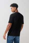 Camiseta negra de Félix el Gato con cuello redondo