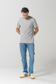 Jean tiro bajo straight leg azul con bota recta y bolsillos