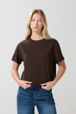 Camiseta unicolor crop top cuello redondo con manga corta