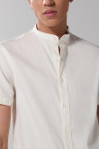 Camisa unicolor cuello nerú en algodón con botones