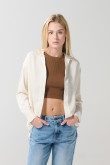 Blusa en satín unicolor con manga larga y botones