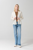 Blusa en satín unicolor con manga larga y botones