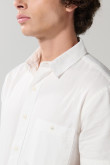 Camisa en algodón unicolor manga corta con cuello sport