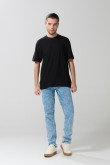 Jean slim azul claro ajustado con diseños y tiro bajo