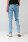 Jean slim azul claro ajustado con diseños y tiro bajo
