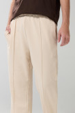 Pantalón jogger unicolor con bota recta y vena en frente