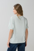 Camiseta verde clara manga corta con arte de Looney Tunes