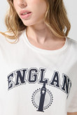 Camiseta crop top crema college con manga corta