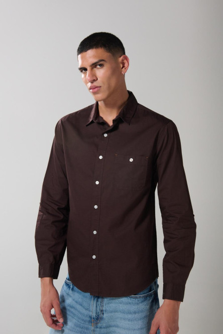 Camisa unicolor en algodón manga larga con bolsillo