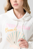 Buzo crema oversize con capota y diseño de playa