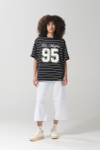 Camiseta a rayas oversize azul college con manga corta