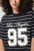 Camiseta a rayas oversize azul college con manga corta
