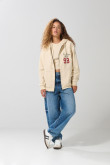 Buzo kaki oversize con cremallera, capota y diseños college