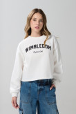 Buzo crema claro crop top con arte college en frente