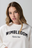 Buzo crema claro crop top con arte college en frente