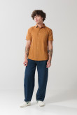 Camisa en algodón unicolor manga corta con cuello sport