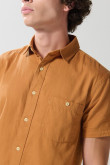 Camisa en algodón unicolor manga corta con cuello sport
