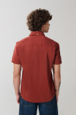 Camisa en algodón unicolor manga corta con cuello sport