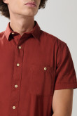 Camisa en algodón unicolor manga corta con cuello sport